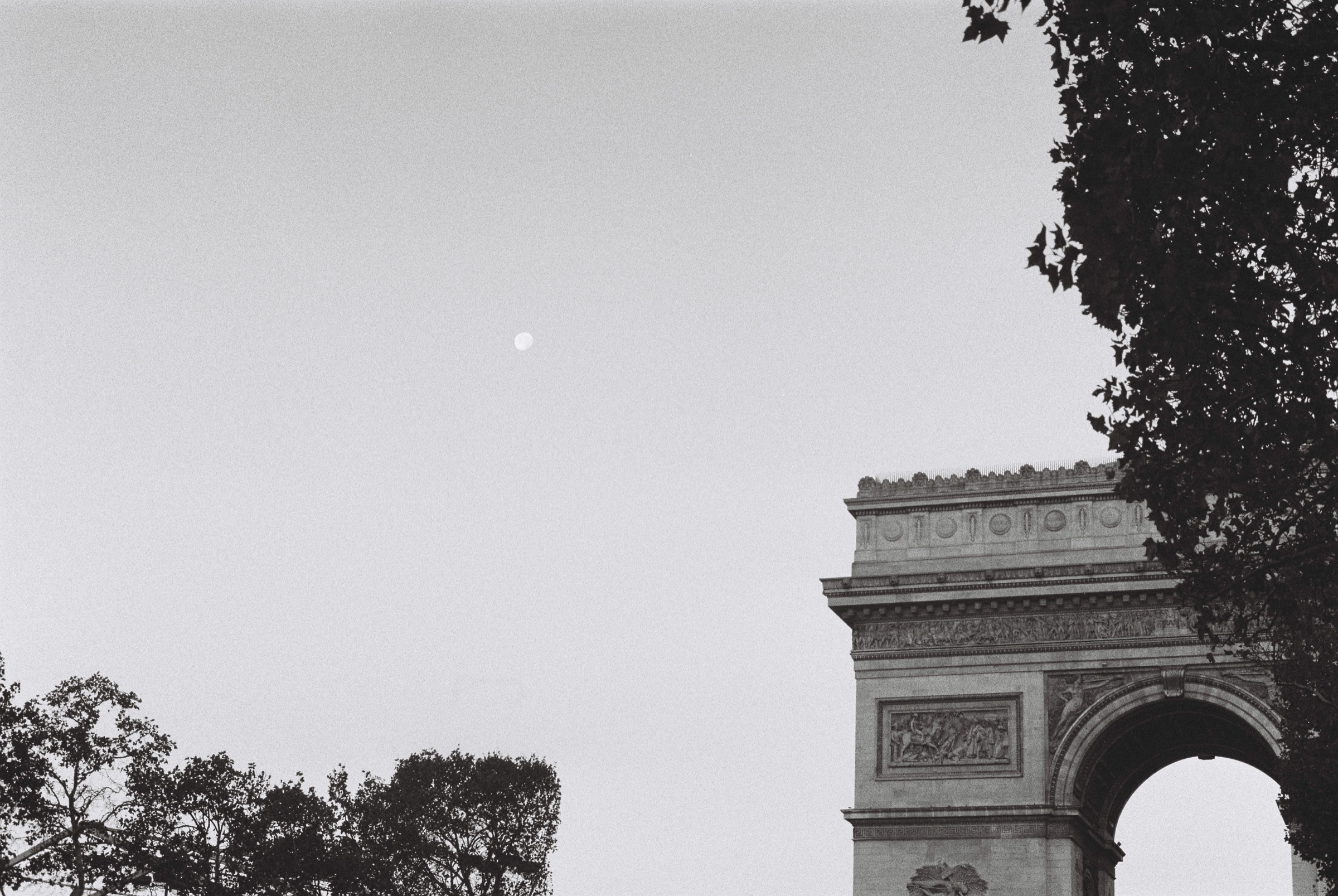 arc de triomphe under a pale moon, film photograph